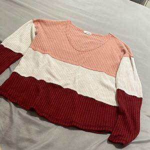 Eyeshadow Long sleeve Brand size M. Pink, white, and red color.